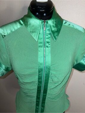 Bebe satin trim zip-up top in a gorgeous mint green shade. New without tags.